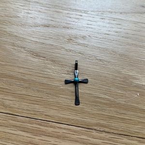 Sterling silver cross pendant with turquoise accent